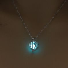 Glow In The Dark Pumpkin Crown Necklace Available in colors: Blue, Green and Aqua. Can be worn throughout the day. A brilliant gift idea In order to get the best result, place the necklace directly into sunlight or under a light source (UV flashlight, white bulb etc) should get you a beautiful glow. When fully charged it will glow brightly for the first 40 minutes and after that it fades out slowly in the following hours. For easy to use, you can charge by your smart phone app "flashlight" so you can charge it up again in a matter of seconds when the glow wears out. UV light or natural sunlight works best for any glow in the dark product. Pumpkin Crown, Glowing Pumpkin, Uv Flashlight, Dark Jewelry, Crown Necklace, Crystal Pendants, Pendants Necklace, Tarnished Jewelry, Stone Choker