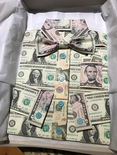 a bow tie made out of dollar bills