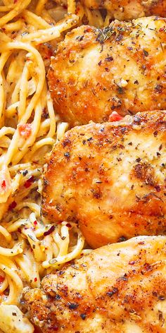 some chicken and pasta are in a pan