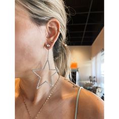 It isn't hard to be the star of the show when you're wearing the these Star Earrings. These rhinestone star earrings are a unique take on a drop earring. Pair with your night out look and these will glisten under the disco ball and catch some eyes. Drop Earring, Disco Ball, Star Earrings, The Star, Silver Gold, Night Out, Drop Earrings, Stars, Silver