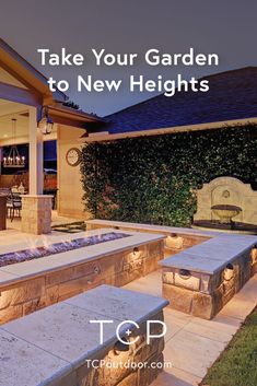 an outdoor patio with stone benches and lights on the side, in front of a house