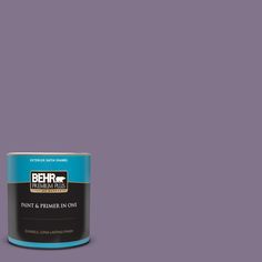 the behr ultra paint is shown in an open, brown tin with no lid