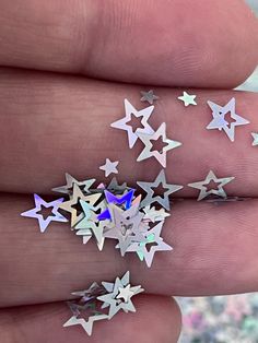 🌸Loose Glitter star shapes 🌸 ➜ High-quality  ➜Polyester  ➜ non-toxic,  ➜solvent resistant.  𝐓𝐡𝐞𝐬𝐞 𝐠𝐥𝐢𝐭𝐭𝐞𝐫𝐬 𝐚𝐫𝐞 𝐢𝐧 𝐑𝐀𝐖 𝐟𝐨𝐫𝐦. 𝐒𝐨 𝐲𝐨𝐮 𝐡𝐚𝐯𝐞 𝐭𝐡𝐞 𝐚𝐛𝐢𝐥𝐢𝐭𝐲 𝐭𝐨 𝐮𝐬𝐞 𝐭𝐡𝐞𝐦 𝐢𝐧 𝐬𝐞𝐯𝐞𝐫𝐚𝐥 𝐦𝐞𝐝𝐢𝐮𝐦𝐬 𝐥𝐢𝐤𝐞 𝐀𝐜𝐫𝐲𝐥𝐢𝐜 , 𝐆𝐞𝐥 𝐁𝐮𝐢𝐥𝐝𝐞𝐫, 𝐚𝐧𝐝 𝐆𝐞𝐥 𝐩𝐨𝐥𝐢𝐬𝐡. ❤️𝗖𝗔𝗡 𝗔𝗟𝗦𝗢 𝗕𝗘 𝗨𝗦𝗘𝗗 𝗙𝗢𝗥 𝗖𝗥𝗔𝗙𝗧𝗜𝗡𝗚❤️ Photos  taken to show the best possible image that the color looks like in person. Due to the multiple variations of screens, monitors, and lighting sources, we cannot guarantee that the color you see on your screen accurately portrays the true color of the product Gel Builder, Suki Waterhouse, Nail Glitter, Loose Glitter, Making Paper, Acrylic Gel, Glitter Nail, Glitter Stars, Acrylic Powder