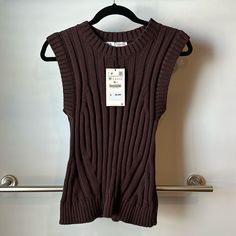 Nwt Zara Sweater Vest Size: Medium Color: Burgundy/Brown Condition: New With Tag Thanks For Looking! Purple Ribbed Knit Tops, Zara Purple Top For Fall, Zara Sleeveless Sweater For Winter, Zara Sleeveless Winter Sweater, Casual Purple Zara Tops, Zara Sweater, Sweater Vest, Sweaters For Women, Zara