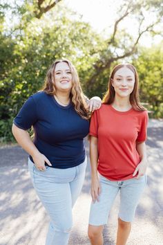 Introducing our Matilda Top - a solid tee that's perfect for any occasion! Available in two unique colors - navy blue and muted red/marsala hue - this top features ribbed contrasts for added texture and style. A must-have for your wardrobe. Material doesn't have a lot of stretch. Fits true to size, but if you like a roomier fit, we would recommend sizing up. Model is wearing a small and is 5'6". Plus model is wearing a 1X and is 5'7". Size Chart Length Bust S 23" 36" M 24" 38" L 25" 40" XL 25" 4 Red Short Sleeve Top For Everyday, Navy Tops For Everyday Fall Wear, Navy Short Sleeve Tops For Fall, Muted Red, Tiered Dresses, Plus Model, Teen Dress, Hanging Fabric, Spring Fits