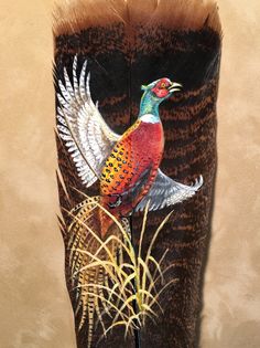 a boot with a bird painted on the side and feathers sticking out of it's sides