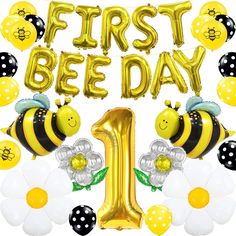 the first bee day balloon decoration is in gold and black with flowers, bees and balloons