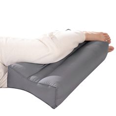 a woman laying on top of an inflatable mattress