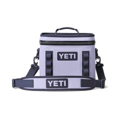 the yeti cooler bag is white and black