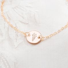 Our birth flower Disc personalised bracelet gives you the ability to wear a little token of your personality represented with beautiful hand-drawn birth flowers. With twelve intricately embellished birth flowers to choose from, we have a special personalised gift to compliment her style. Looking for that perfect birthday gift, special mothers day gift or a unique friendship bracelet? Whether she's an April Daisy, a June Rose or a May Lily, give a special birth flower with this beautiful jeweller Rose Gold Birth Flower Jewelry For Wedding, Rose Gold Wedding Jewelry With Birth Flower Detail, Rose Gold Wedding Jewelry With Birth Flower, Personalized Rose Gold Charm Bracelet For Wedding, Personalized Minimalist Charm Bracelet For Wedding, Minimalist Personalized Charm Bracelet For Wedding, Adjustable Birth Flower Jewelry For Wedding, Rose Gold Birth Flower Jewelry For Bridesmaids, Personalized Flower Jewelry For Bridesmaids