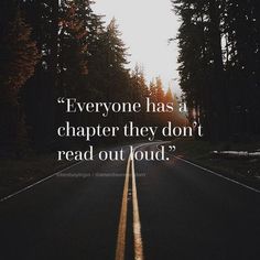 an empty road with the words everyone has a character they don't read out loud