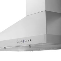 a white stove top oven sitting on top of a metal shelf with lights above it