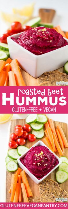 roasted beet hummus with carrots and cucumbers on a cutting board