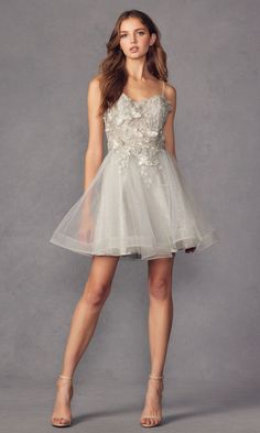 So cute, this short a-line butterfly homecoming dress is perfect for even the most festive events. Whether you're going to a school dance, homecoming, or another semi-formal, this babydoll party dress shines with 3-D butterflies on the corset-style bodice. Thin shoulder straps lead to the lace-up back of this short dance dress, while the fully-lined short babydoll skirt has a sheer tulle overlay that flows to the hem in an a-line shape. Offered in misses and some plus sizes, this short a-line bu Butterfly Homecoming Dress, Short Dance Dresses, Short Sleeveless Dress, Butterfly Applique, Satin Evening Gown, Fabric Glitter, Layered Tulle Skirt, Bra Cup, 3d Butterfly