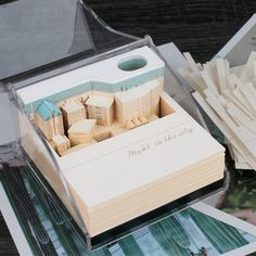 there is a box that has an architectural model in it