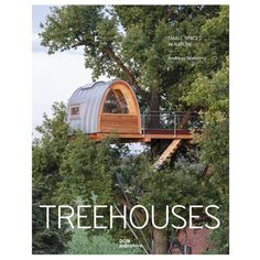 the cover of treehousees magazine with trees and a house in the middle of it