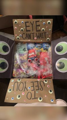 an eye can't wait box with various items in it