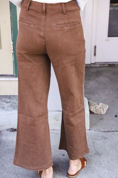 Be stylish and comfortable in Feelings for You Brown Pants. These brown wide leg cropped pants are made of durable materials with a button closure. They offer a large inseam of 26.5" to provide a perfect fit. A classic style, these pants are perfect for any occasion. Wide Leg Cropped Pants, Brown Pants, Pants Large, Cropped Pants, A Button, Classic Style, Wide Leg, Perfect Fit, Feelings