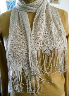 "212 A Ladies knitted light weight silver scarf with silver lurex. 59\" long with 5\" long fringes, 9\" wide. Vintage but in a very good condition, no damages, no signs of wearing. This scarf is suitable for day and evening wear at any time of the year. It's a light and transparent wrap." Scarf With Tassels, Silver Scarf, Floral Shawl, Polyester Scarf, Birthday Gift For Women, Long Fringes, Shawl Wrap, Long Scarf, Holiday Birthday