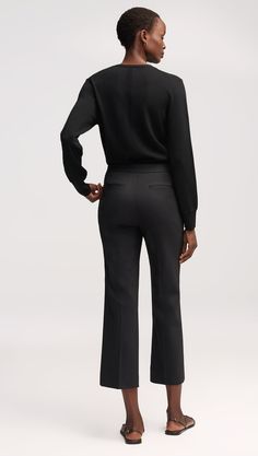 Made of seasonless Italian wool, this versatile pant fits slim through the thigh with a subtle flare and ankle length inseam. Functional details include an exterior credit card pocket, side pockets, and back welt pockets. Pairs well with the Piped Blazer or a casual top. Fitted Ankle-length Pants With Button Cuffs, Tailored Dress Pants For Office In Fall, Classic Fall Pantsuit With Ankle-length Pants, Classic Ankle-length Fall Pantsuit, Classic Fall Ankle-length Pantsuit, Tailored Pants With Button Cuffs For Work, Tailored Pants With Button Cuffs For Office, Fitted Wool Wide Leg Pants For Business Casual, Elegant Workwear Pants With Button Cuffs