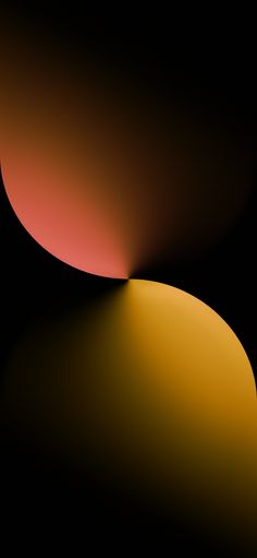 an orange and yellow object in the dark