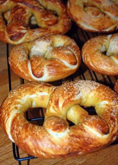 several different types of pastries sitting on cooling racks