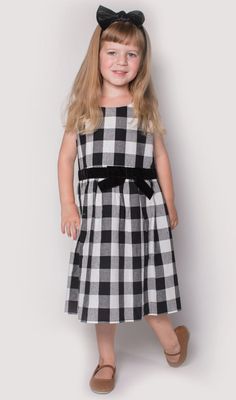 Sleeveless black and white checkered dress with black bow at the waist. Dress has back zipper closure. Color: Black and White Imported Hand-wash with cold water, Line Dry Popatu Style: SPB-12013 Black And White Checkered Dress, Checkered Dress, Black Bow, Waist Dress, Cold Water, Girls Dresses, Hand Wash