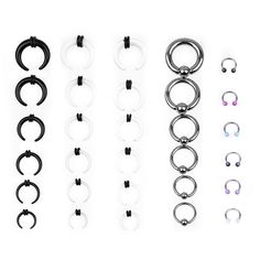 six pairs of circular nose rings in various colors and sizes, all with different piercings