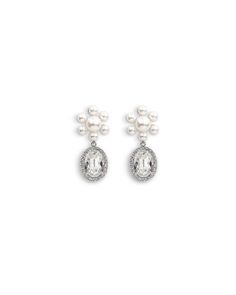 Materials: Rhodium plated brass, Swarovski crystal, Swarovski faux pearl Length: 2" / 5.1cm Made in NYC RR071-02 Silver Pearl Drop Clip-on Earrings For Evening, Evening Crystal Earrings With Pearl Drop, Crystal Pearl Drop Earrings For Evening, Crystal Pearl Drop Earrings For Formal Occasions, Formal Crystal Pearl Drop Earrings, Luxury Pearl Embellished Drop Earrings, Party Pearl Earrings In White Gold, Silver Crystal Pearl Embellished Earrings, Silver Pearl Embellished Crystal Earrings