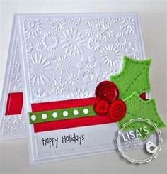 a christmas card with buttons and holly on the front, in white paper that says usa's happy holidays