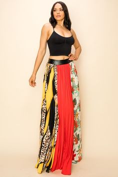 Our Women's Pleated Multi Print Maxi Skirt with Elastic Band is a statement piece for any wardrobe. Crafted from lightweight yet sturdy fabric, it features a unique pleat design with a flexible elastic band for a comfortable, flattering fit. The vibrant prints create a bold, chic look, perfect for any special occasion. A stunning addition to any closet. 100% POLYESTER Red Tiered Maxi Skirt With Elastic Waistband, Red Skirt With Elastic Waistband, Red Skirt With Elastic Waistband For Spring, Red Maxi Skirt With Elastic Waistband, Summer Stretch Skirt With Accordion Pleats, Stretch Summer Skirt With Accordion Pleats, Stretch Accordion Pleat Skirt For Summer, Red Pleated Summer Bottoms, Red Pleated Bottoms For Summer