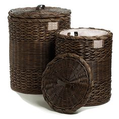 three brown wicker baskets with labels on them