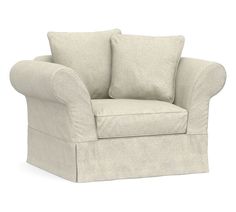 a white chair with two pillows on the armrests and one pillow in the back