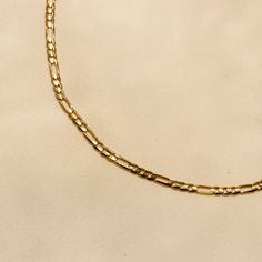 Our 14K Yellow Gold Figaro Chain Choker is the perfect chunky layering choker to add to your neck stack. In Solid Gold, it's a substantial chain that will last you a lifetime. Gold KT: 14K Solid Gold Gold Color: Yellow Gold Choker Length: 14" or 15" Chain Width: 3mm Chain Style: Italian Figaro Chain Clasp Closure: Lobster Claw 14k Gold Chunky Chain Necklace Gift, 14k Gold Chunky Chain Necklace For Gifts, Gold Plated Figaro Chain Choker, Gold-plated Figaro Chain Choker, Yellow Gold Chunky Chain Choker, 14k Yellow Gold Chunky Chain Necklaces, Yellow Gold Curb Chain Choker, Yellow Gold Curb Chain Choker Necklace, Gold Curb Chain Choker