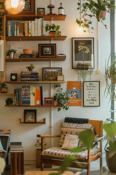 a living room filled with lots of plants and books on the shelves next to a window