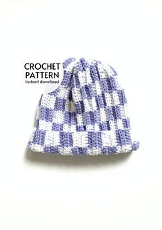 a crochet hat is shown on the cover of a book, which features an image of a blue and white checkered pattern