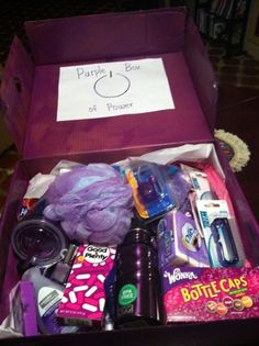 a purple box filled with lots of different items