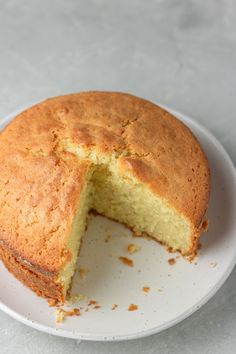 an easy vanilla sponge cake on a white plate