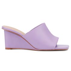 Whether you're heading out for a night on the town or enjoying brunch with friends, the Candie has you covered. This open-toe mule features a chic wedge that combines style with comfort, making it perfect for all-day wear. The versatile design effortlessly complements any outfit, ensuring you look fashionable from day to night. With its blend of elegance and practicality, the Candie is a must-have addition to your wardrobe, offering both sophistication and ease for any occasion. Modern Wedge Sandals For Spring, Modern High Heel Wedge Sandals For Spring, Chic Open Toe Wedge Sandals For Summer, Chic Wedge Heels For Spring, Chic Spring Wedge Heels, Spring High Heel Wedge Sandals With Stacked Heel, Chic Summer Wedge Sandals With Stacked Heel, Spring Beach Wedge Sandals With Padded Heel, Spring Wedge Sandals With Deep Heel Cup