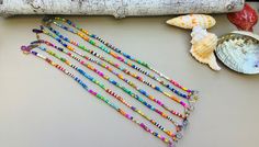 Multicolor Beaded Friendship Bracelets For Beach, Multicolor Beaded Chain Friendship Bracelets For Beach, Beach Multicolor Beaded Friendship Bracelets, Multicolor Beaded Chain Friendship Bracelet For Festivals, Handmade Heishi Bead Anklets, Bohemian Summer Anklets With Colorful Beads, Multicolor Round Beads Anklets For Festival, Multicolor Tiny Beads Anklets For Festivals, Multicolor Beaded Anklets For Vacation