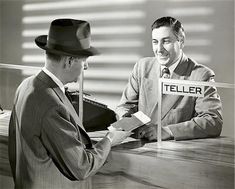 Fortune Teller Costume, Checking Accounts, Bank Teller, Vintage Bank, Art Of Manliness, Finance Bank, Smiling Man, Checking Account, Meeting Place