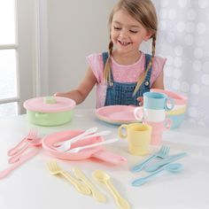 This complete KidKraft 27-Piece Cookware Set in classic pastel colors has everything little cooks and foodies need to serve their friends, family or stuffed animals and dolls. With a lidded pot, pan and place settings for four, this set has everything kids need to be the perfect little hosts. Built from sturdy, easy-to-clean plastic, this set is built to last. It's a perfect addition to any KidKraft play kitchen or role play item and can even be used in our outdoor playhouse and swing set kitchens! 27 total play pieces Durable molded BPA-free plastic in classic pastel colors Goes great with any KidKraft play kitchen or role play item - even great in our outdoor playhouse and swing set kitchens Complete service for 4 (knives, spoons, forks, plates, cups, bowls) and 1 pot, 1 pan and 1 lid No Pastel Cookware, Wooden Kitchen Accessories, 27 Piece, Play Kitchen Accessories, Play Kitchens, Kids Play Kitchen, Play Kitchen Sets, Pretend Food, Eating Utensils