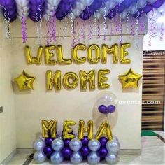 the welcome home sign is decorated with balloons and streamers in purple, silver and white colors