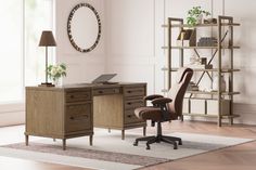 an office with a desk, chair and bookcase in the middle of it is shown