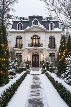 Elegant mansion with a snowy path and festive lights. Unwrap the secrets of posh house facades and pick up clever ideas to make cardboard castles look like mansions. Cardboard Castles, Posh House, Rich Houses, Posh Houses, Elegant Mansion, Snowy Path, Porch Supports, French Chateau Style, House Mediterranean