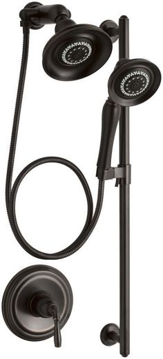 the shower faucet is attached to a pole with two handset hoses