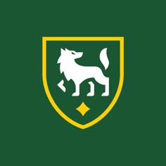 a green and yellow shield with a dog on it