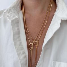 Gold Filled Knotted Lariat Necklace | Herringbone Snake Chain Y Necklace | Gold Mini Cube Chain Link Layering Necklace | Long Drop Necklace Super chic and minimal that goes well with all outfits. Adjustable, you have a choice of clasping it at 20" or 22" Lariat necklace with 3" drop in the center. Check out more styles: https://jordanskyjewelry.etsy.com Handmade and designed in NY. ------------------------------- M A T E R I A L S  18K gold filled  Thanks for supporting our small business❤︎ ---- Gold Lariat Necklace Simple, Luxury Lariat Toggle Necklace With Chain, Adjustable Lariat Chain Necklace In Metal, Adjustable Metal Lariat Chain Necklace, Elegant Adjustable Snake Chain Lariat Necklace, Chic Metal Lariat Necklace With Adjustable Chain, Adjustable Length Metal Lariat Necklace, Metal Lariat Necklace With Chain, Metal Lariat Necklace With Chain Detail