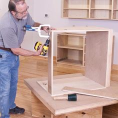 Discover a fast and simple way to construct frameless "32mm system" cabinets in melamine, MDF, or birch plywood. Also read about a new way to assemble drawers in short order using the Metal Box system. Plywood Joinery, Workshop Cabinets, Project Paper, Oak Floating Shelves, Simple Woodworking Plans, Wood Magazine, Shop Cabinets, Woodworking For Kids, Router Table