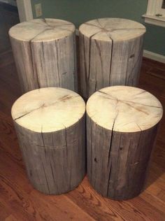 four wooden logs stacked on top of each other